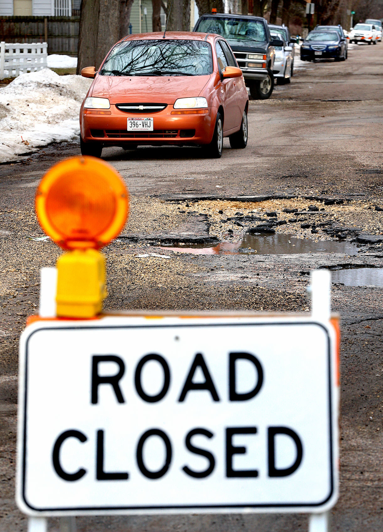 Spring thaw reveals La Crosse's cratered streets